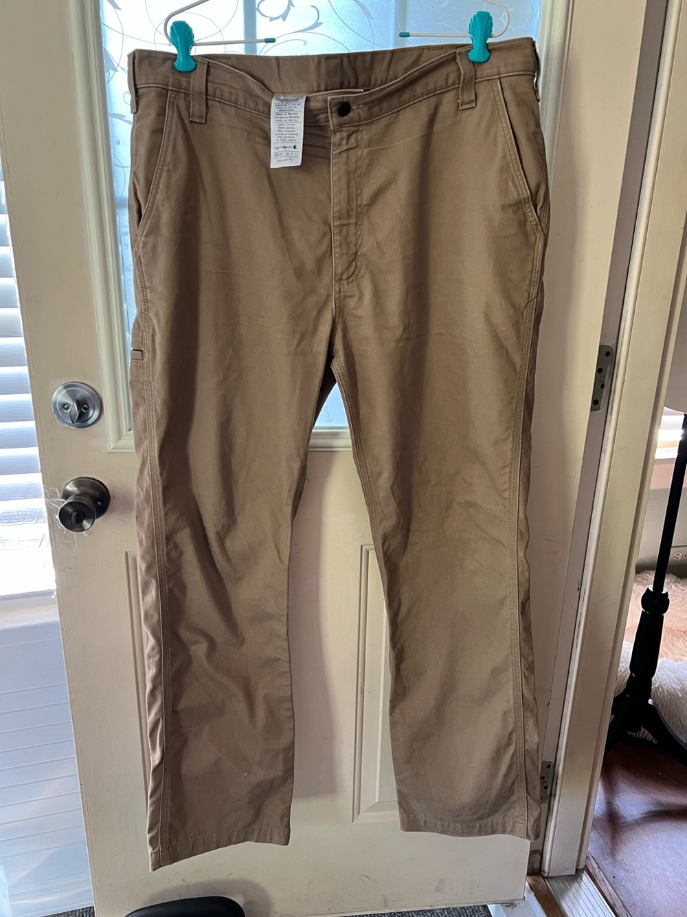 Carhartt Relaxed Fit Rugged work khaki pants on 38x32 size.